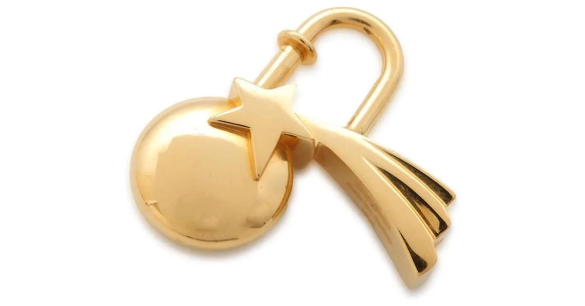 Candado Shooting Star de Hermès Dorado 
