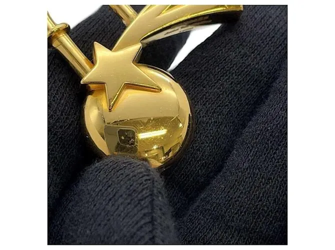 Candado Shooting Star de Hermès Dorado 