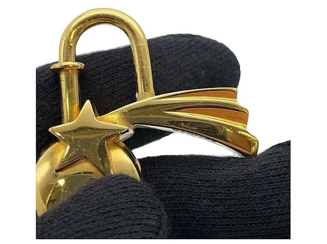 Candado Shooting Star de Hermès Dorado 