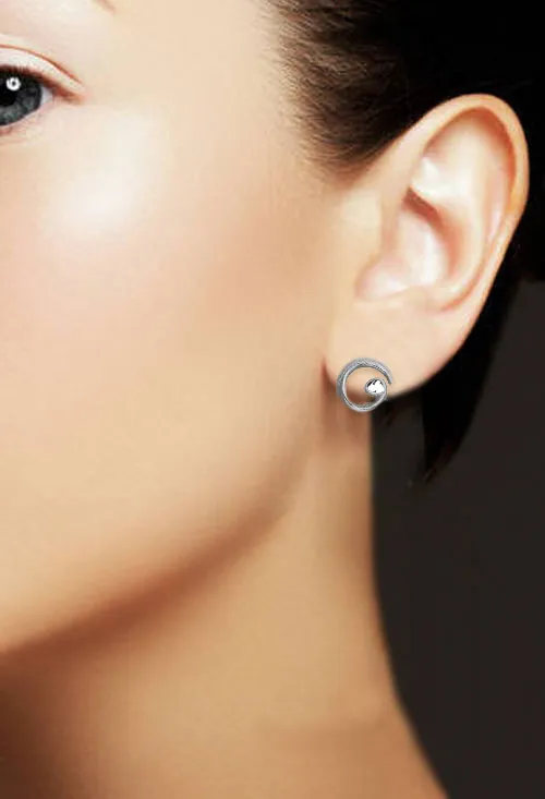 Pendientes plata diseño Jorge Revilla colección Diamantes